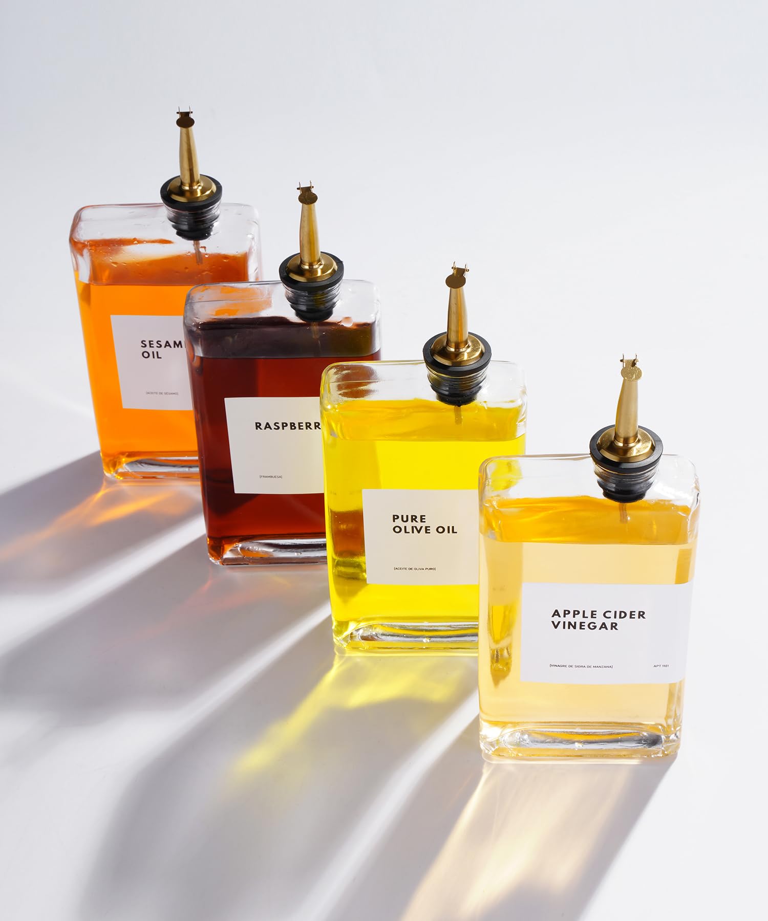 Conjunto dispensadores APT 1101 para aceite, vinagre y salsas en dorado.