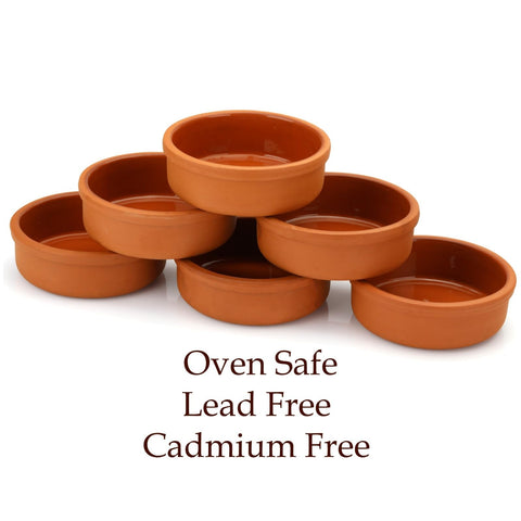 Areste platos de terracota mexicana para presentar comidas tradicionales