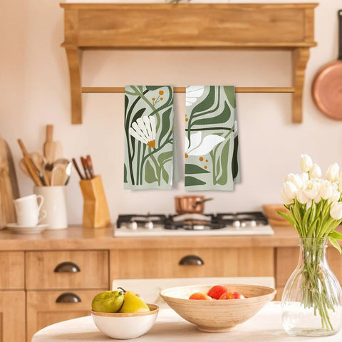 Conjunto de toallas ArtisaEura en verde salvia, ideal para decorar y absorber.