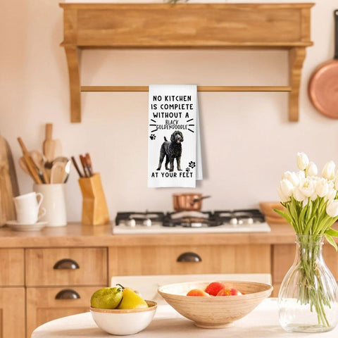 Toallas de cocina ArtisaEura con patrón panal negro, decoran la cocina.