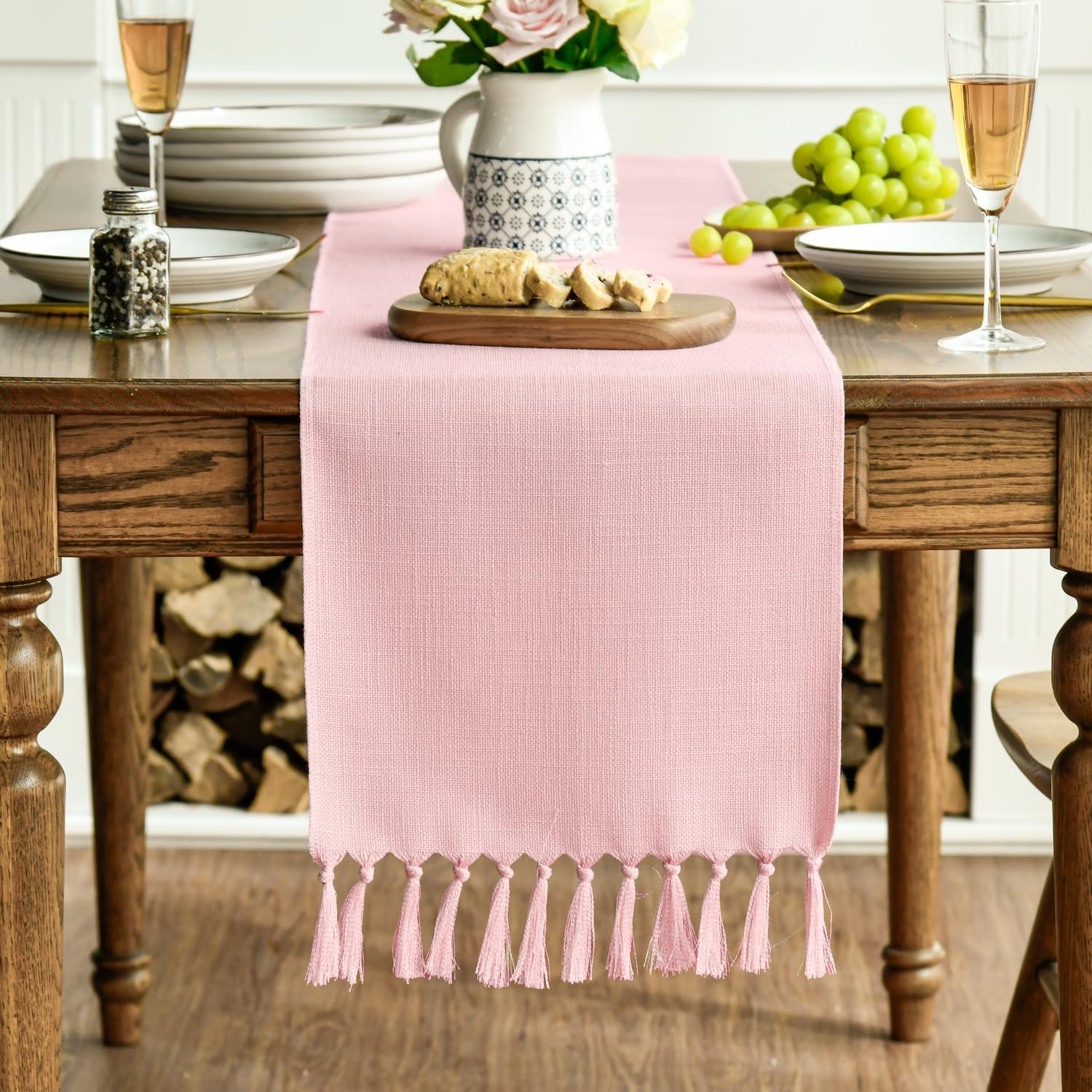 Artoid Mode cubre-mesa borlas rosado, detalle elegante para cenas diarias.