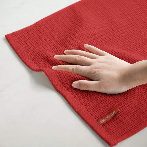 Lavado a máquina con agua fría para minimizar encogimiento y preservar absorción.