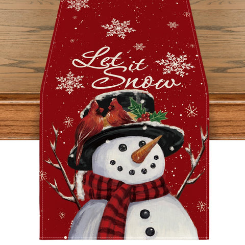 Mantel Artoid Mode con diseño de nieve roja para mesa festiva.