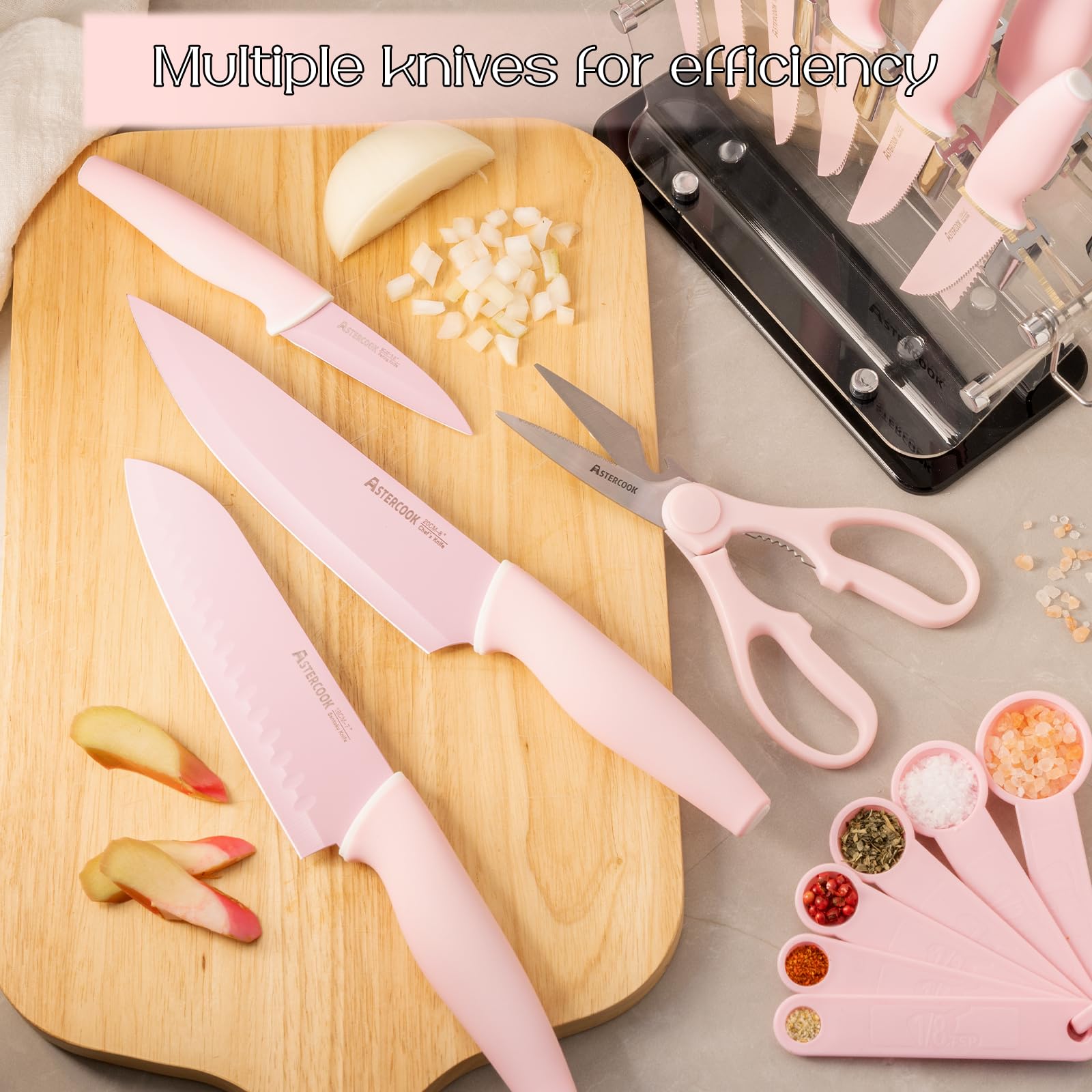 Cuchillos ergonómicos de Astercook en tono rosa para un agarre cómodo.