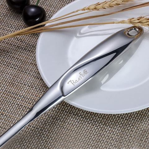 BAERFO Cucharón para sopa con mango aislante y diseño ergonómico para uso cómodo.