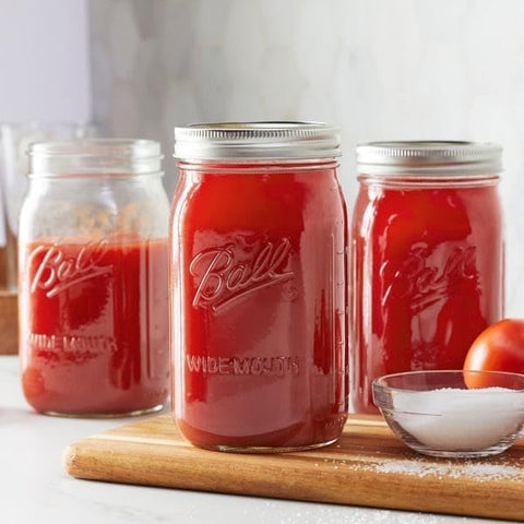 Tarros Ball 4-pack 32 oz con tapas.