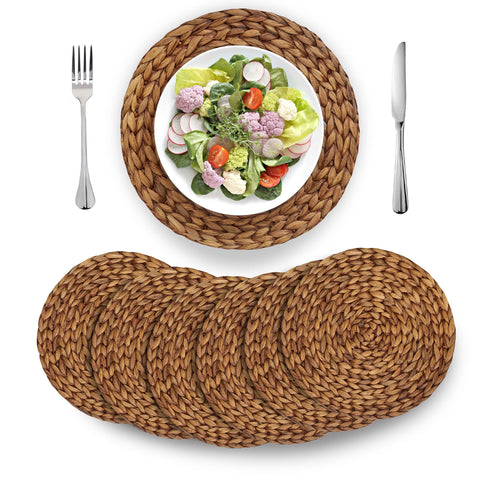 Barien salvamanteles redondo de mimbre natural, protege la mesa y añade calidez natural.