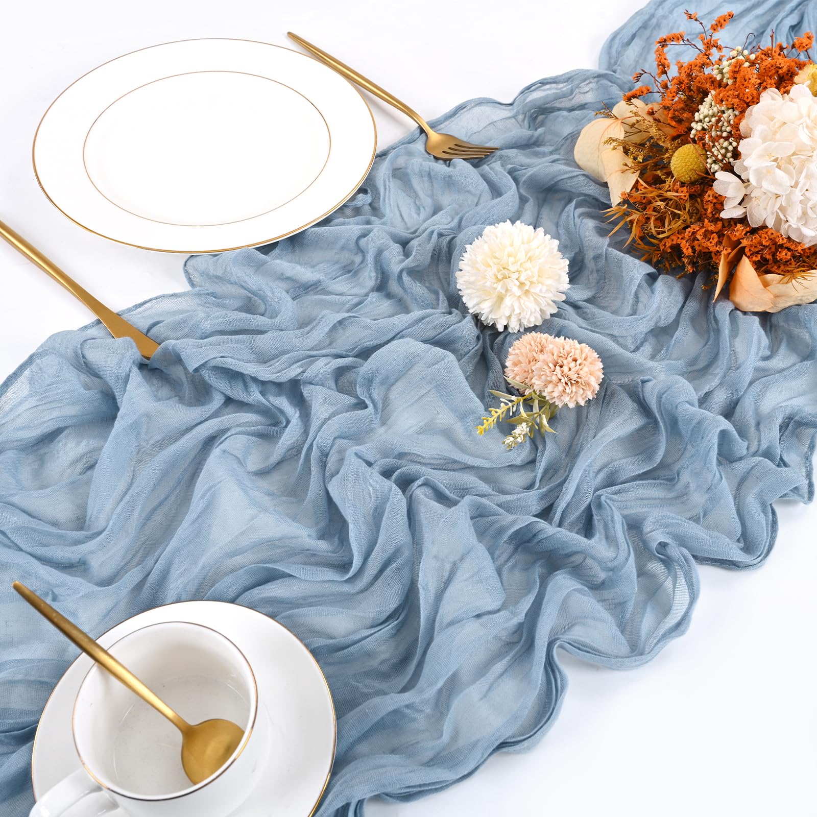 Detalle plegado Beautane en gasa azul para mesa elegante