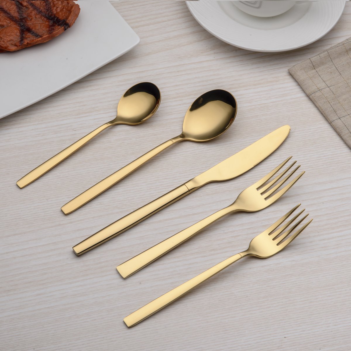 Berglander cubiertos oro-titanio: tenedor de té para acompañar infusiones