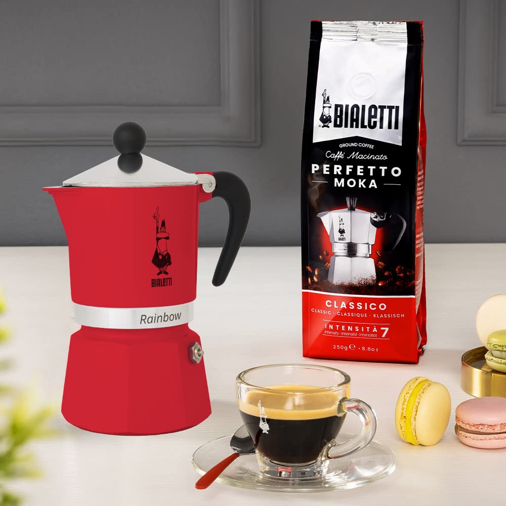 Bialetti Moka Express Rainbow Rojo, tapa visible, válvula de seguridad patentada.