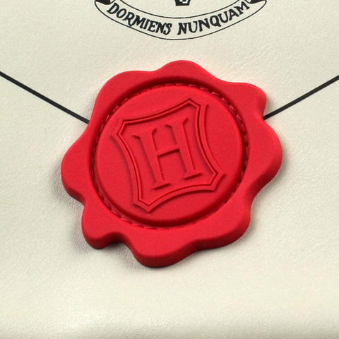 Bioworld cierre con sello rojo que replica la carta de Hogwarts