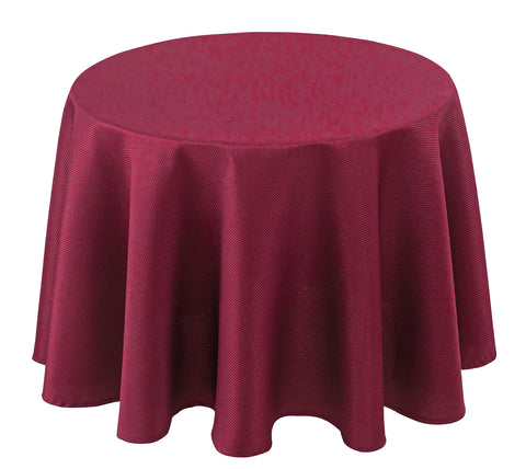 Mantel Biscaynebay redondo texturizado de 70 pulgadas añade elegancia a la mesa.