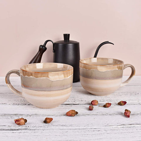 Bosmarlin: taza con mango en forma de interrogación para agarre estable.