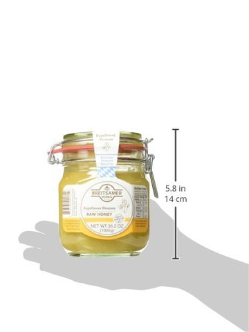 Miel Breitsamer flor de colza en ámbar, sabor suave para tostadas y postres.