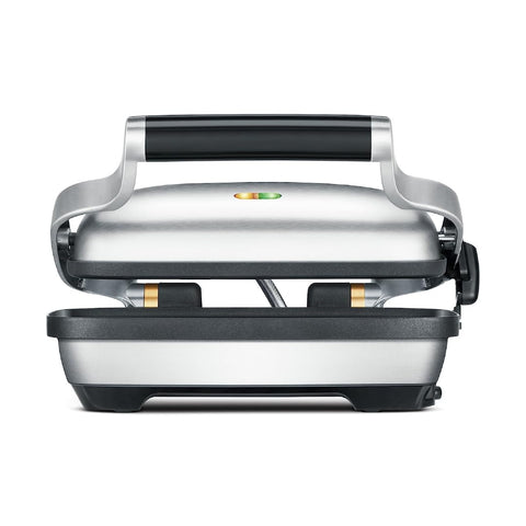 Breville The Perfect Press muestra la bisagra Crush Control para dorar por fuera sin aplastar el interior.