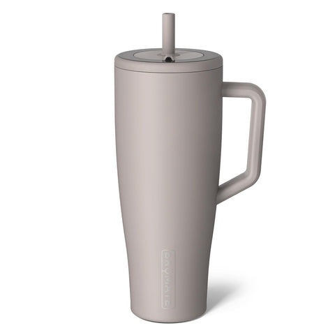 BrüMate Era 40 oz con manija para llevar, conveniente en exteriores.