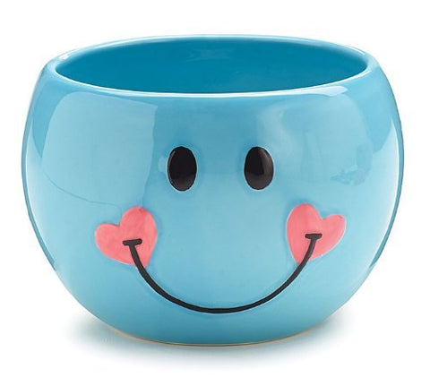 Burton+BURTON maceta azul con carita sonriente y corazones, ideal para plantas pequeñas o bandeja de dulces.