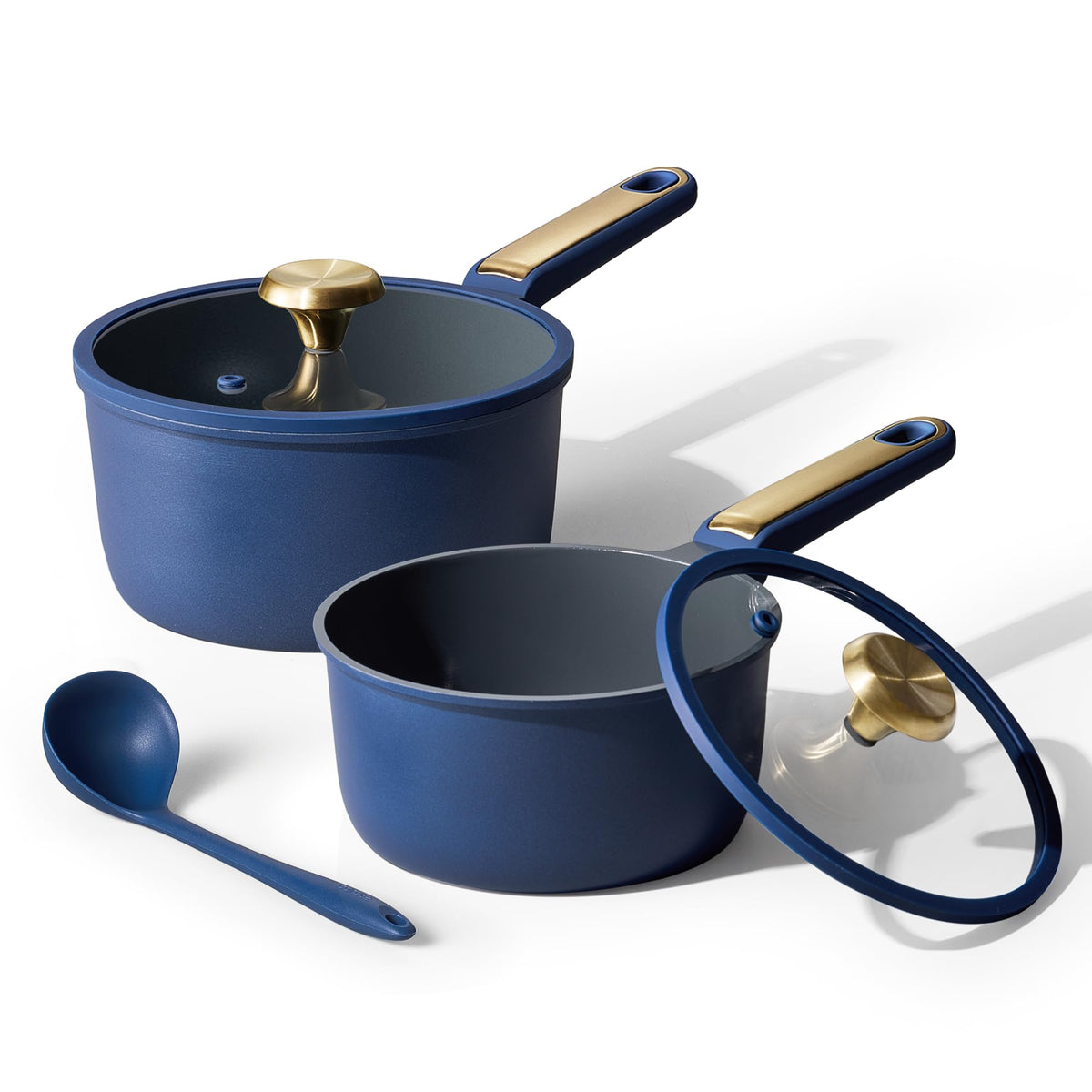 Sartenes CAROTE 2qt y 2.5qt en azul con tapa para cocción uniforme.