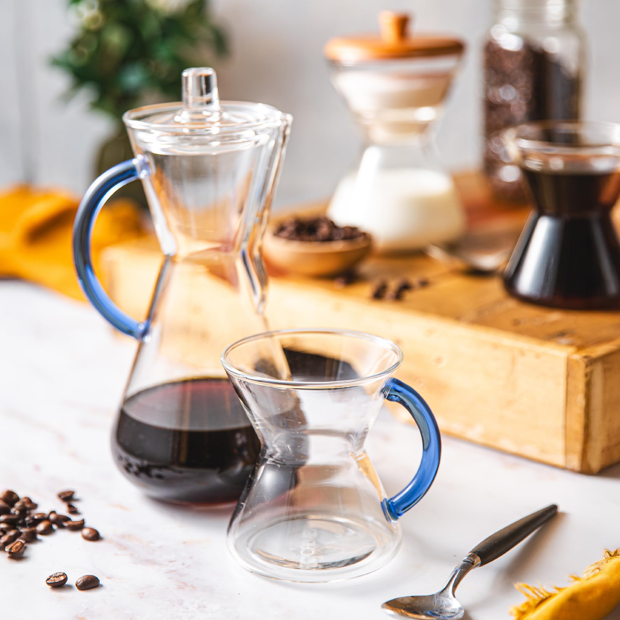 Chemex tapa de vidrio lateral, evita evaporación para conservar aromas.