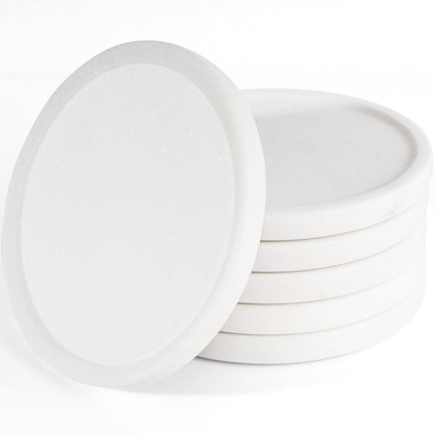 CHISELED ST DF SK posavasos mármol blanco para mesa de café con estilo elegante.