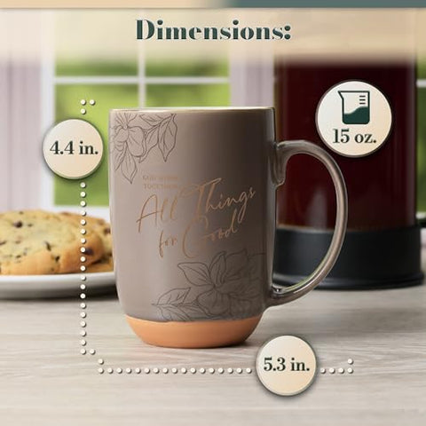 Taza Christian Art Gifts con diseño floral tono topo y blanco para bebidas.