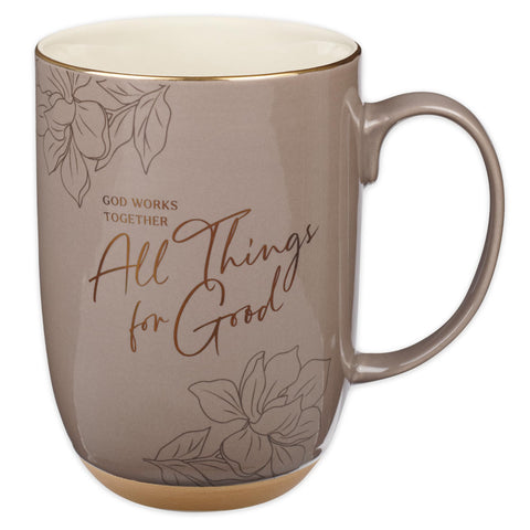 Taza Christian Art Gifts con versículo en oro para reflexión matutina.