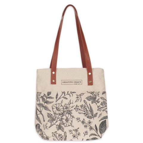 Tote Christian Art Gifts con lona canvas floral, ideal para uso diario y organización.