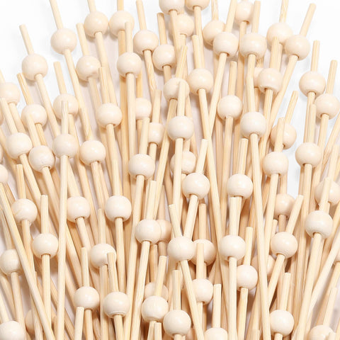 CockStixs palillos de bambú para cócteles, presentación limpia y profesional.