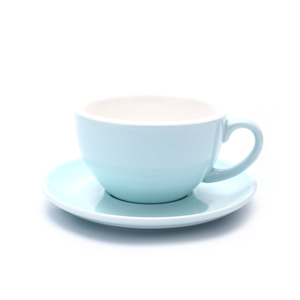 Taza Coffeezone Cappuccino con arte latte en azul brillante, ideal para barista.