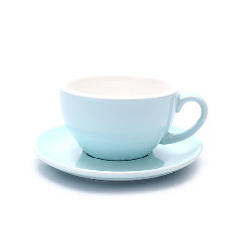 Taza Coffeezone Cappuccino con arte latte en azul brillante, ideal para barista.