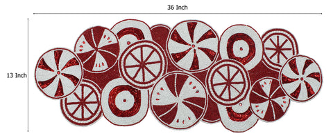 Detalle de cuentas rojas y blancas de COTTON CRAFT para acento festivo.
