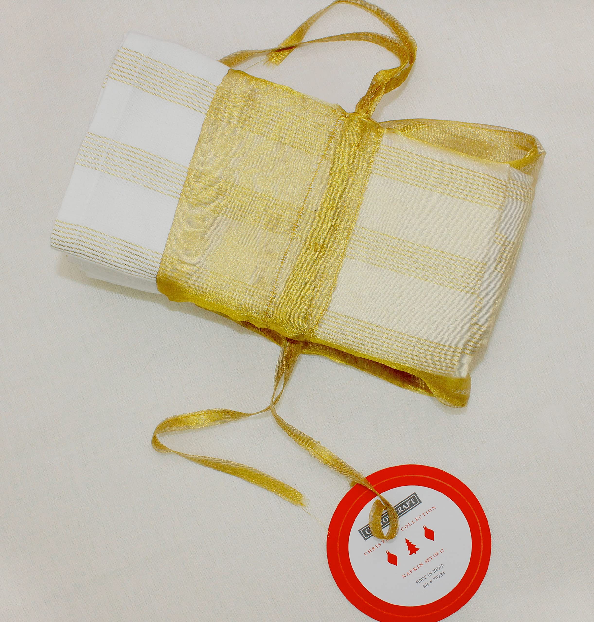 Cotton Craft bordes blanco y oro para un toque sofisticado.