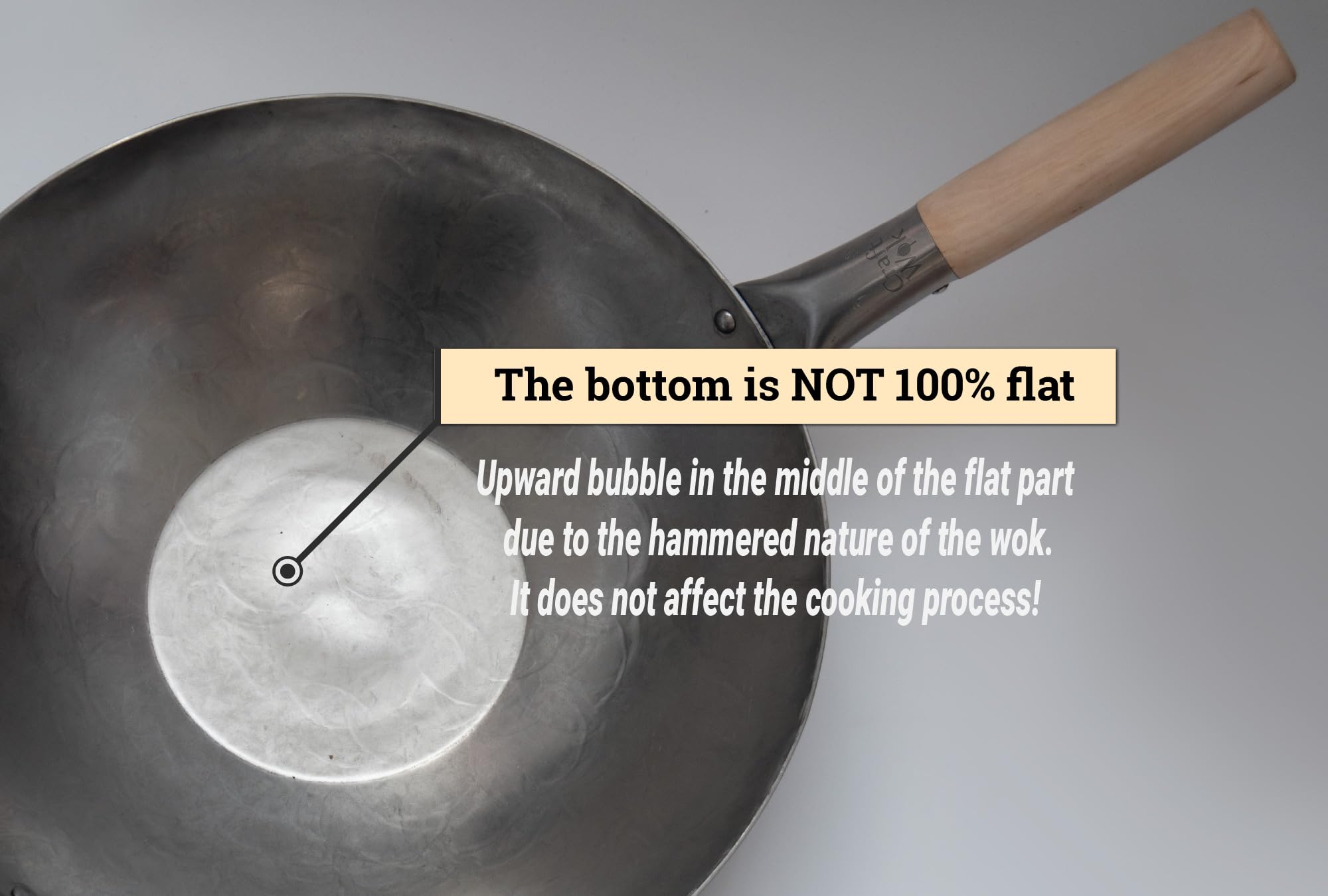 Craft Wok con asa de madera ergonómica para un agarre seguro durante salteados.