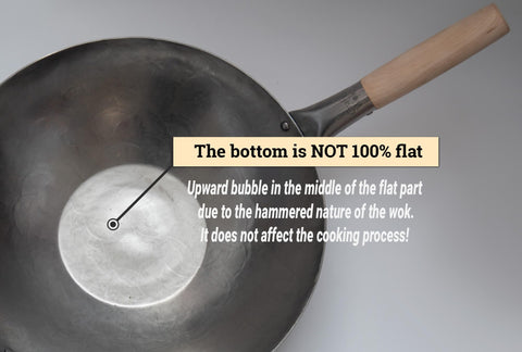 Craft Wok con asa de madera ergonómica para un agarre seguro durante salteados.
