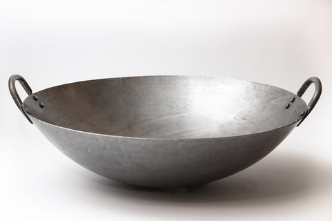 Craft Wok hecho a mano en Guangzhou, calidad artesanal para uso diario.