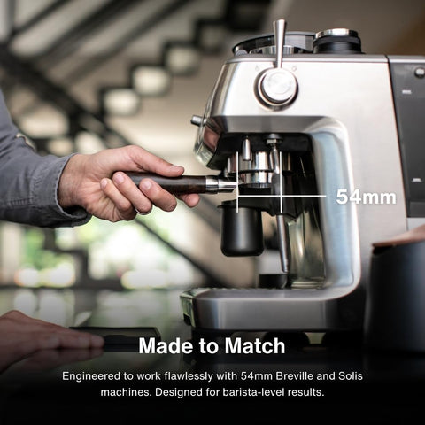 CREMA Cesta doble 54mm lista para espresso con filtración estable.