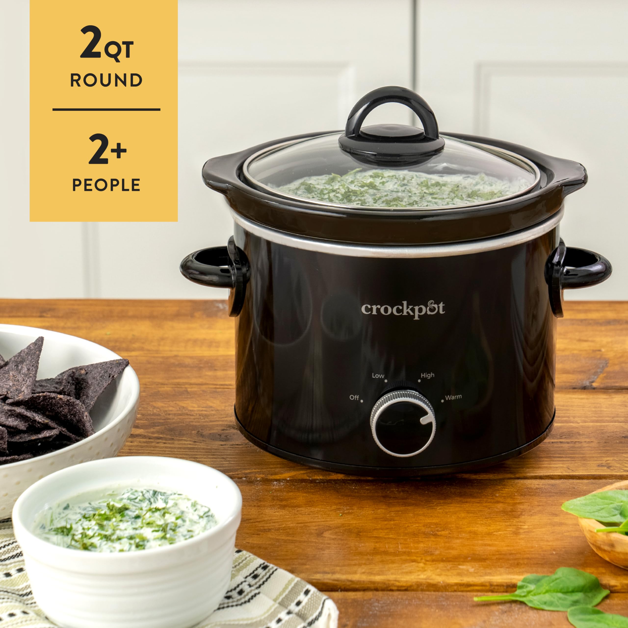 Crock-Pot piedra y tapa en lavavajillas ilustrando limpieza sencilla