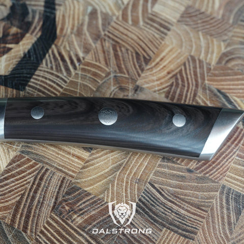 Dalstrong Gladiator cuchillo chef 8 pulgadas rendimiento duradero para uso intensivo.
