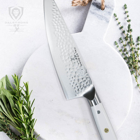 Dalstrong mango ABS blanco ergonómico ofrece control y comodidad durante preparaciones.