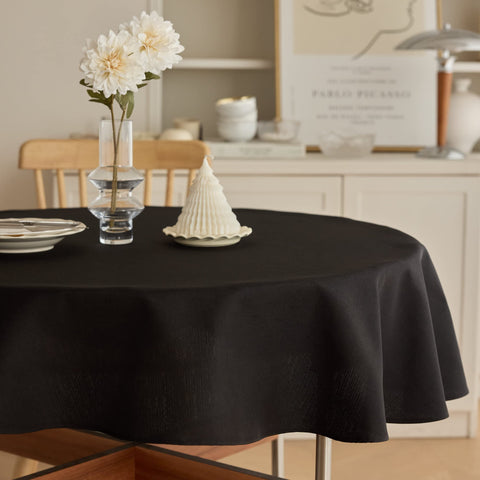 Mantel impermeable Decorelia redondo de 60 pulgadas protege la mesa y eleva la decoración