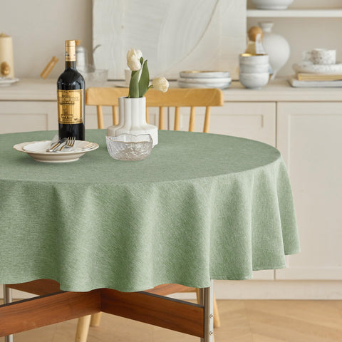 Mantel Decorelia redondo de 60 pulgadas en Sage Verde, impermeable y protege la mesa.