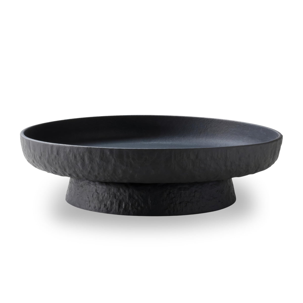 Bol DeNestora en granito negro mate con pedestal, ideal como centro de mesa.