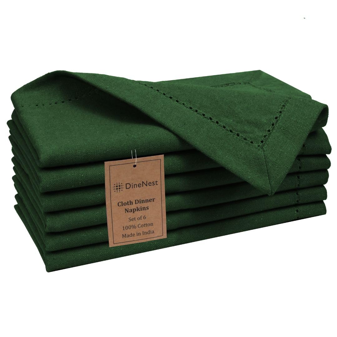 DineNest servilletas verde con ribete calado, suaves y absorbentes para cualquier comida.