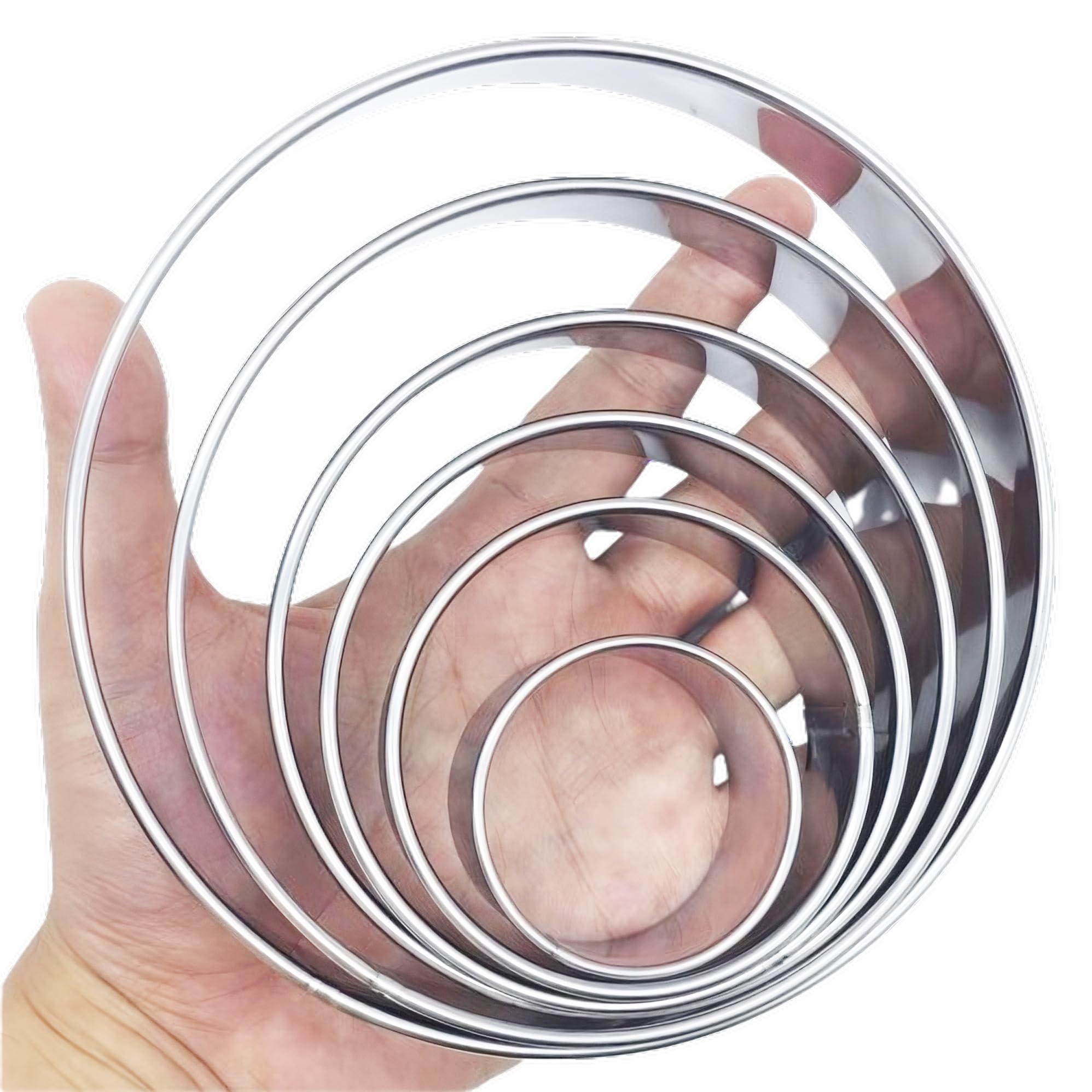 Doczen conjunto de cortadores circulares para galletas de 6 piezas, ideal para diseños variados.