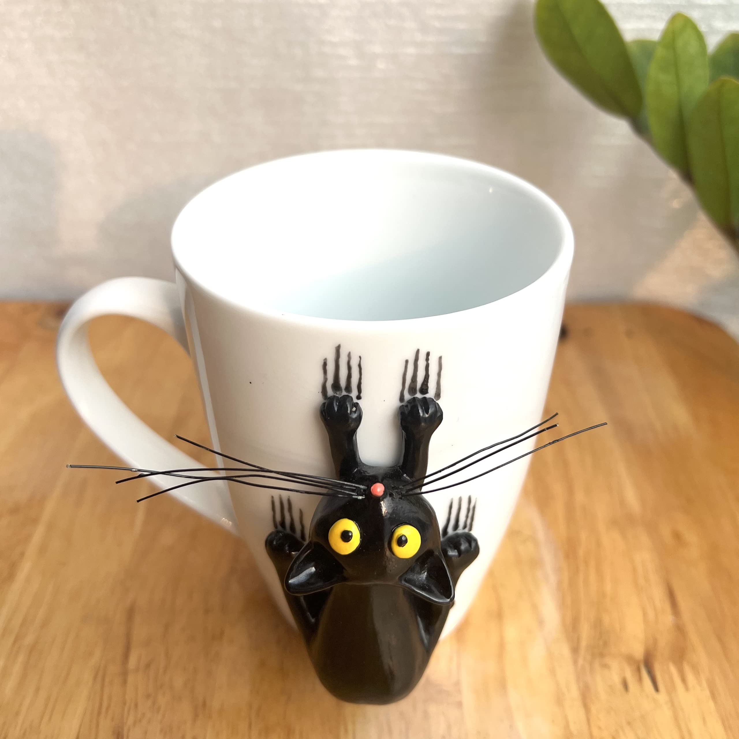DongNaiWin taza gato negro 3D, detalle de la figurita para despertar con humor.