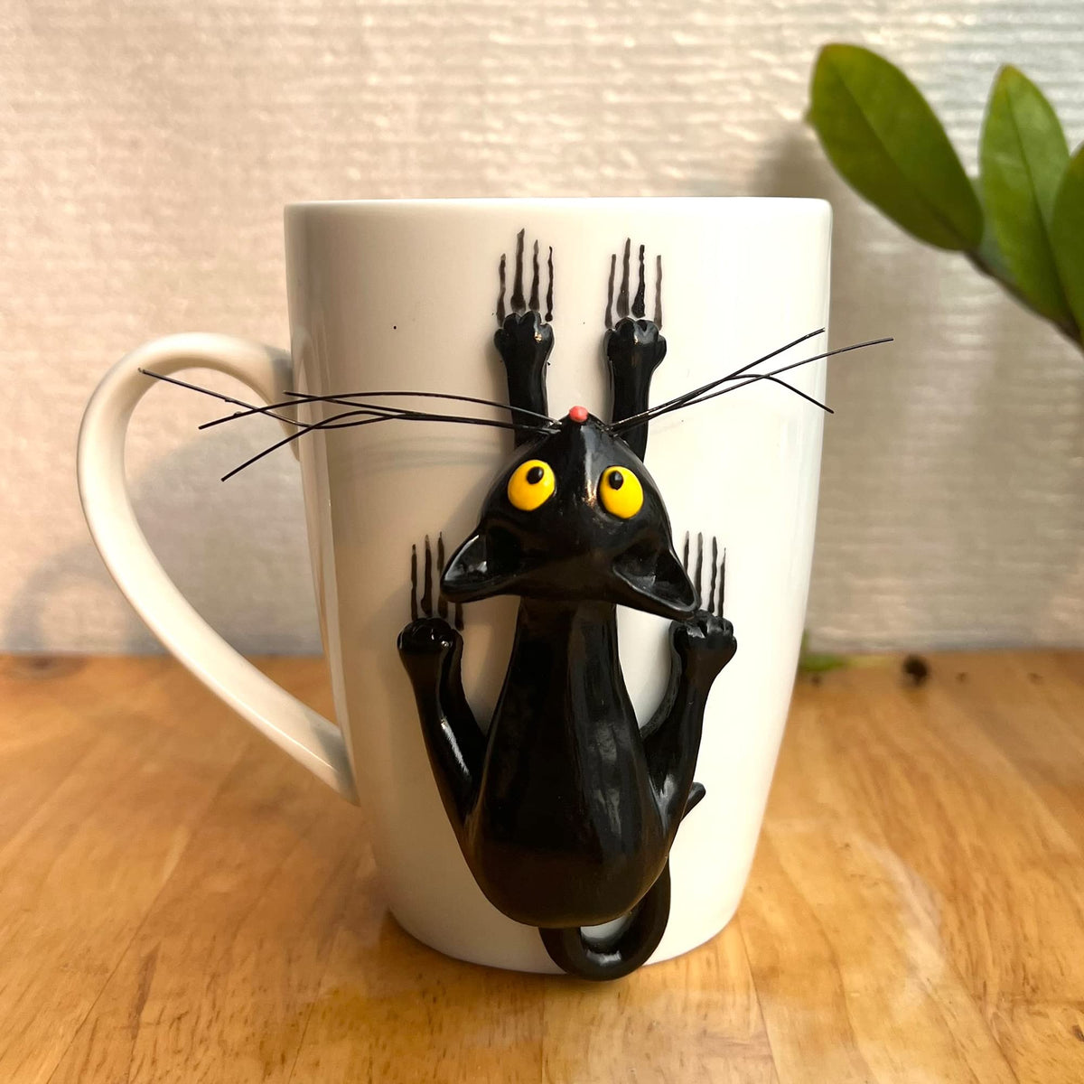 DongNaiWin taza gato negro 3D, vista frontal, ideal para disfrutar café con estilo.