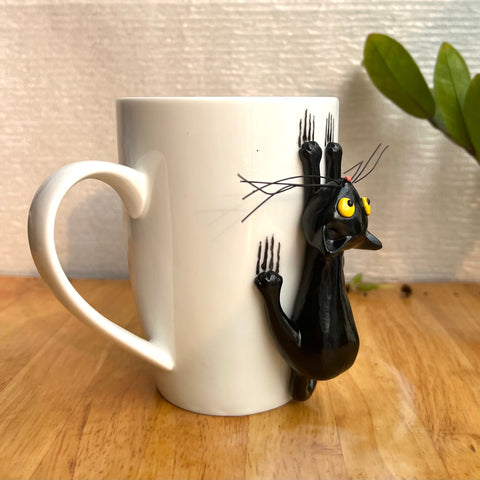 DongNaiWin taza gato negro 3D, vista lateral, asa en forma de cola para un agarre cómodo.