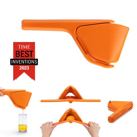 Dreamfarm Fluicer Original en uso con limón y naranja para exprimido suave.