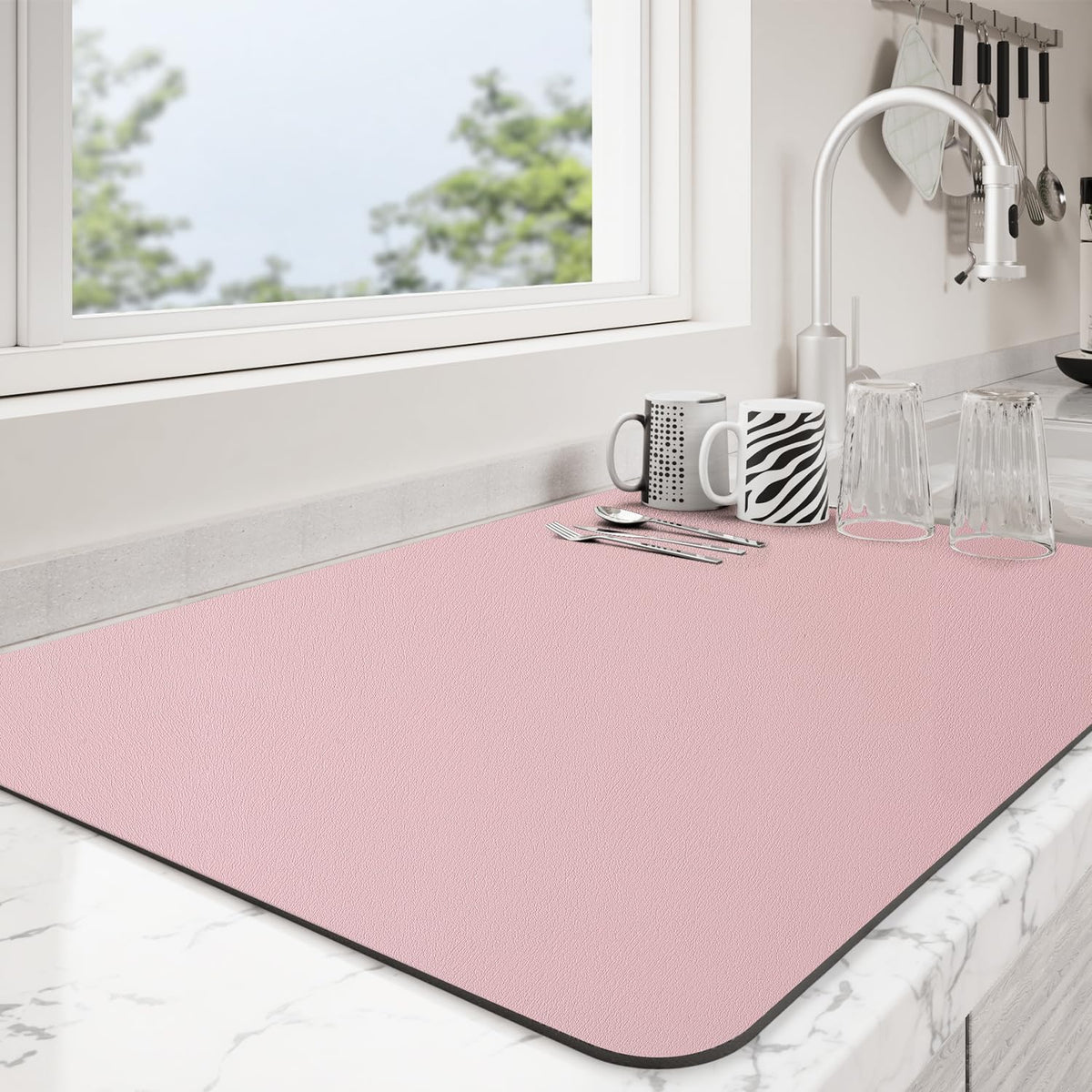 Ecotrim almohadilla secado para platos rosa con absorción rápida.