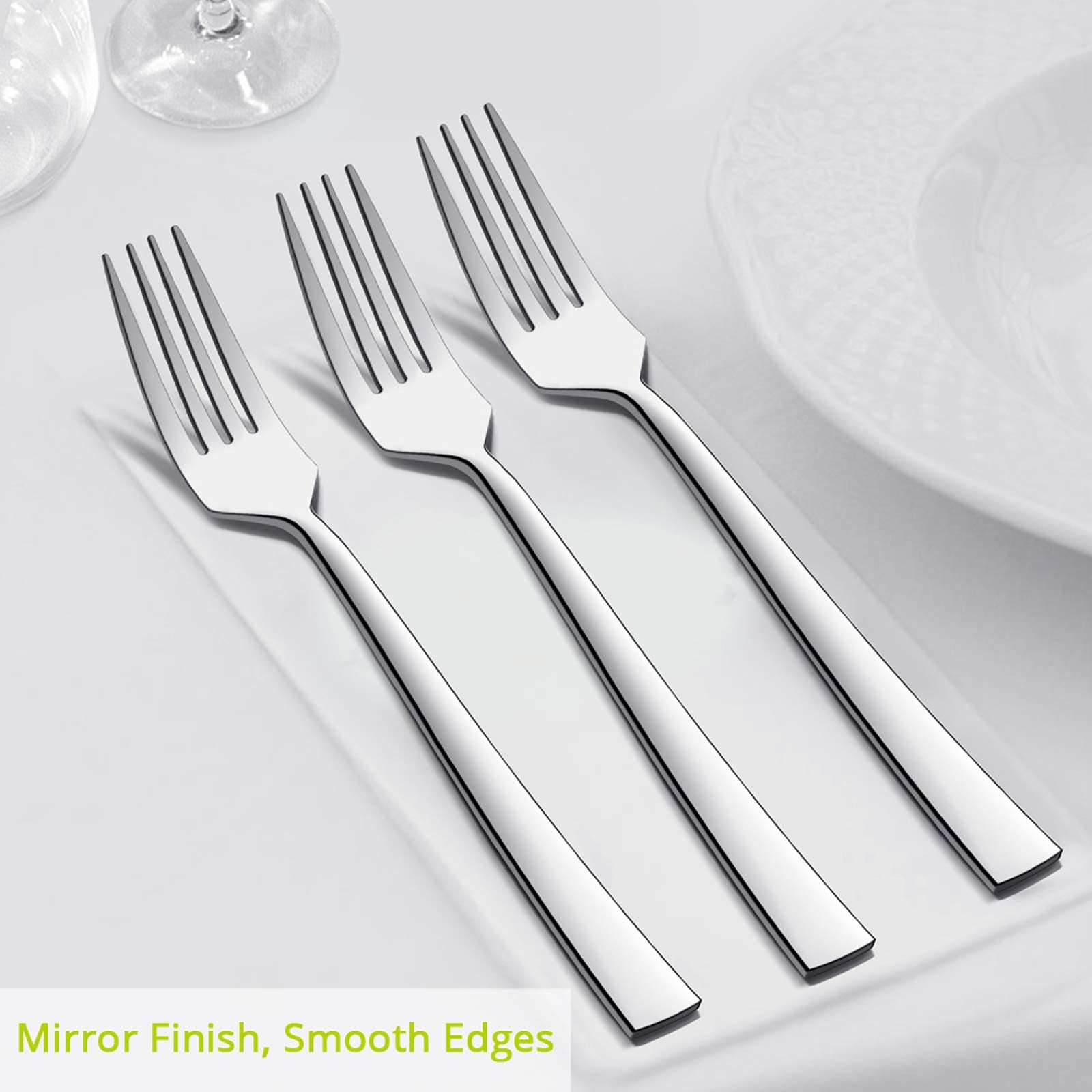 Acabado espejo de E-far mantiene brillo elegante en la mesa.